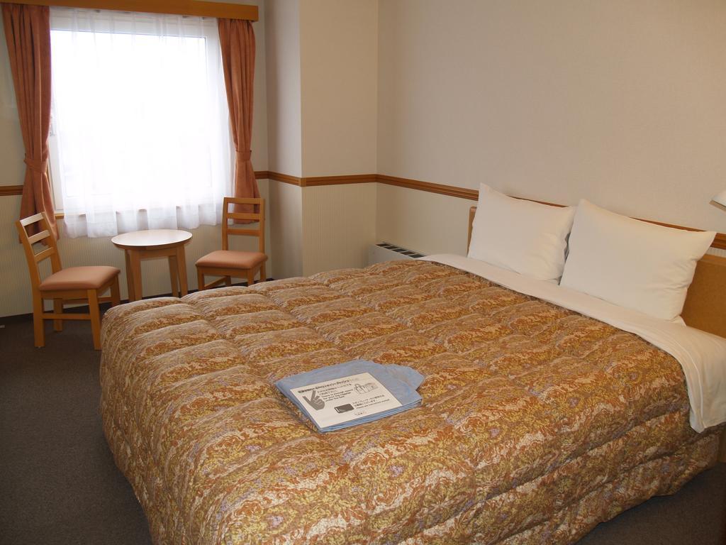 Hotel Route-Inn Fukui Ekimae Номер фото